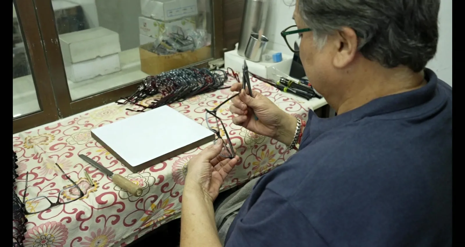 A frame being checked at the inspection bench